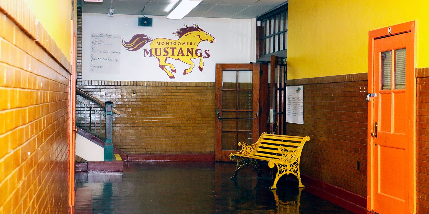 Montgomery prep hallway with bench.
